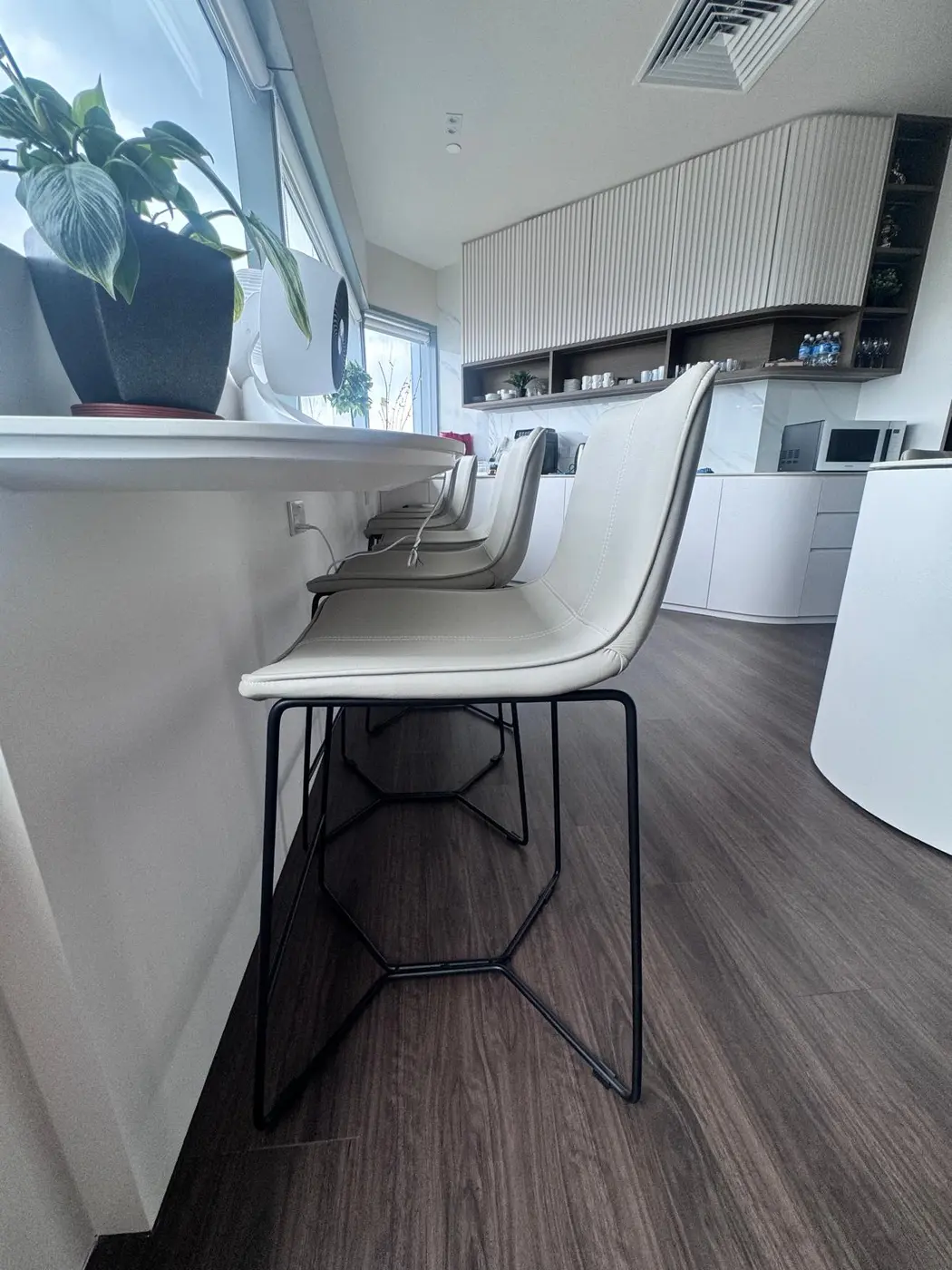 Office pantry bar stools and custom cabinetry