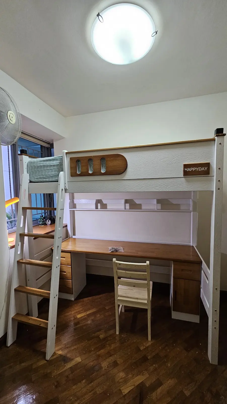 Custom timber bunk bed with integrated study desk and shelving