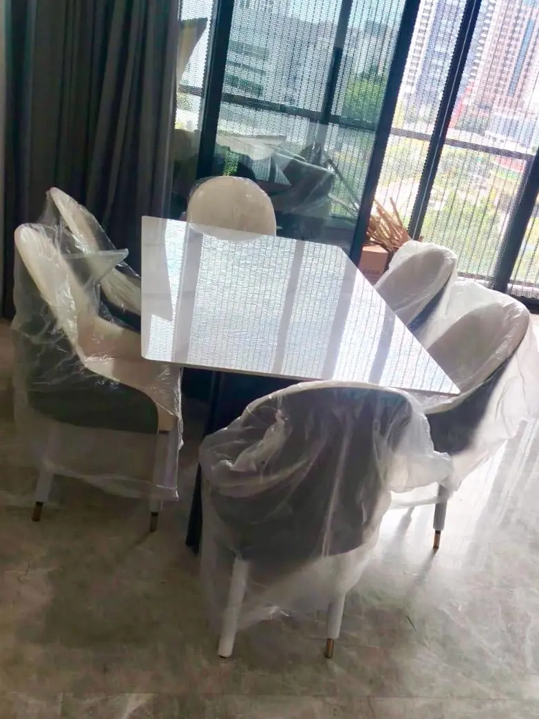 Dining table and chairs delivered for a residential project
