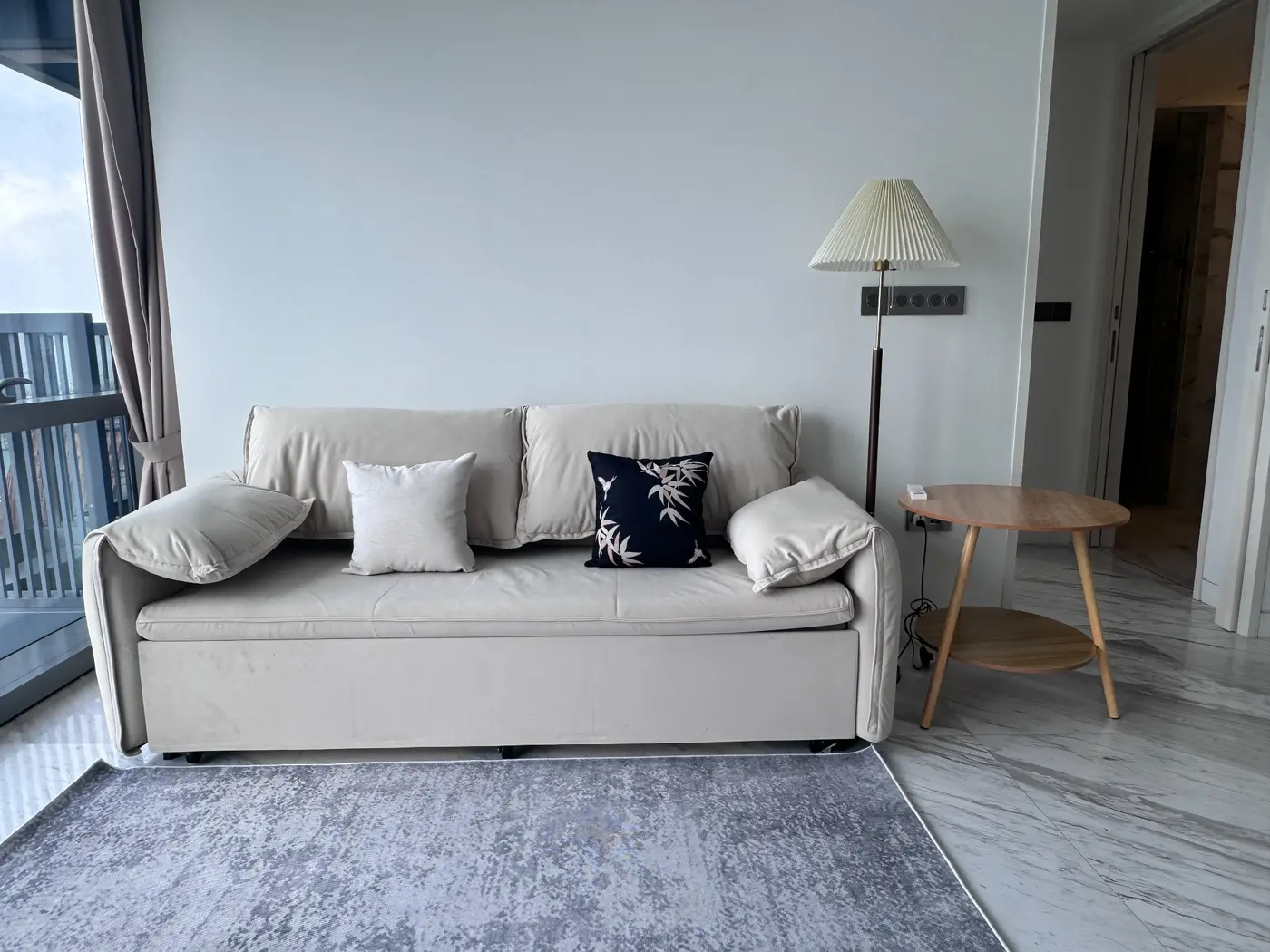 Completed residential sofa area with floor lamp and side table