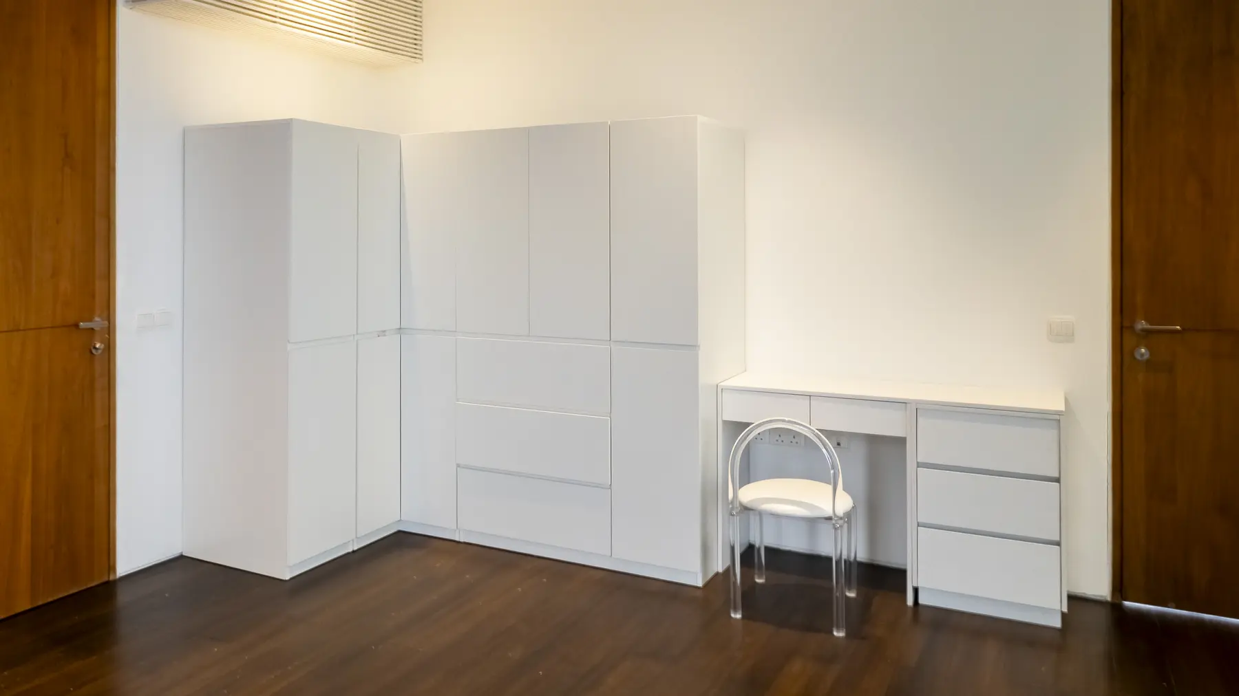 Full white wardrobe and vanity wall