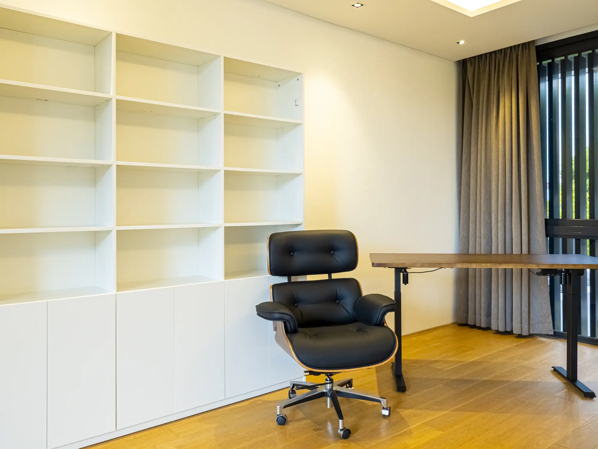 Built-in white study storage and office chair