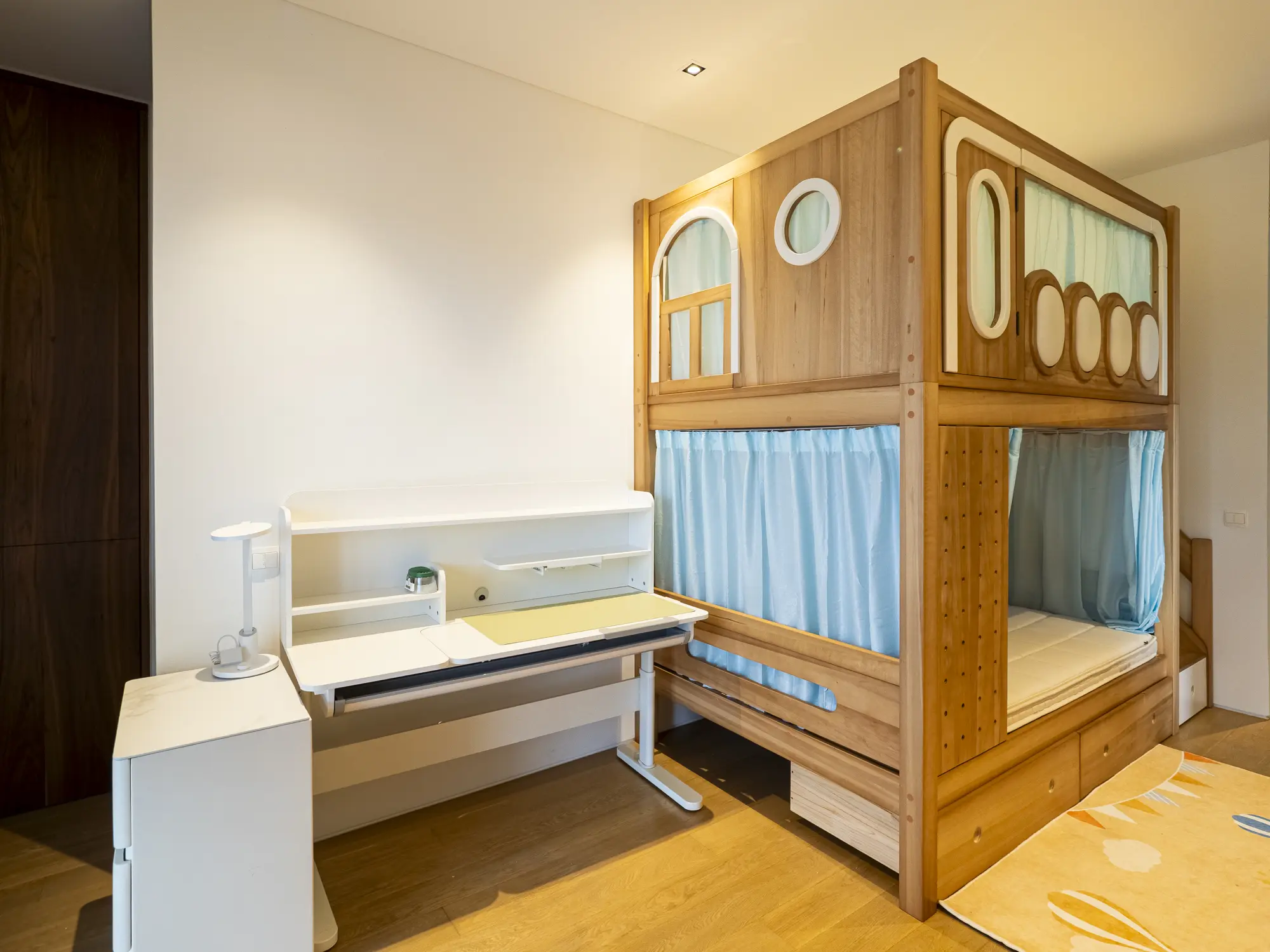 Custom bunk bed and integrated children’s study desk